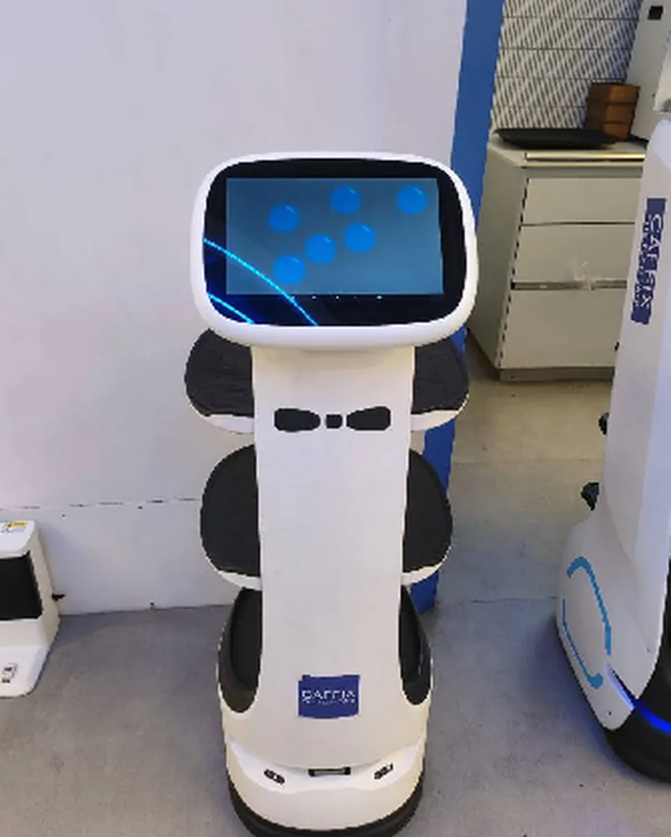 A serving robot at Caffix