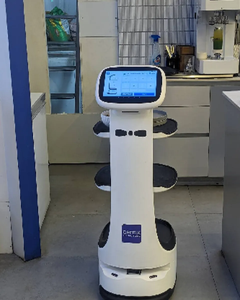 The Caffix robot delivering an order