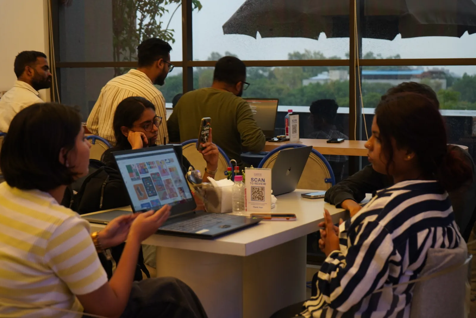 Guests working on laptops at Caffix